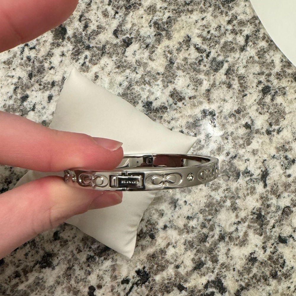 Coach silver clasp bangle